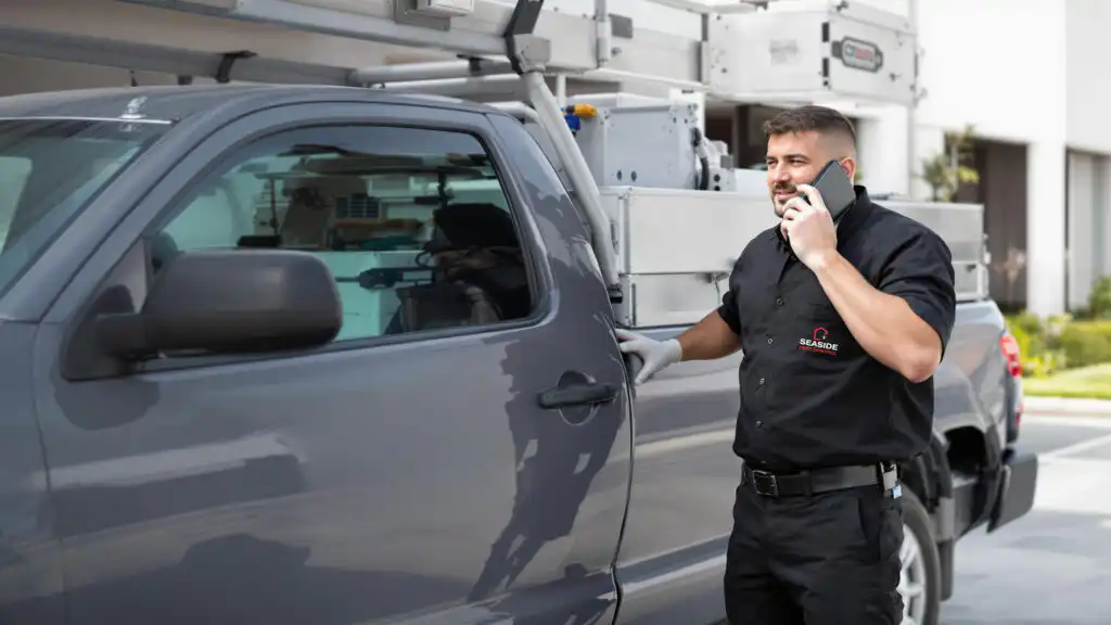 Rodent Control in Richmond  Seaside Pest Control Technician Reviews Post-Treatment Results with Commercial Client